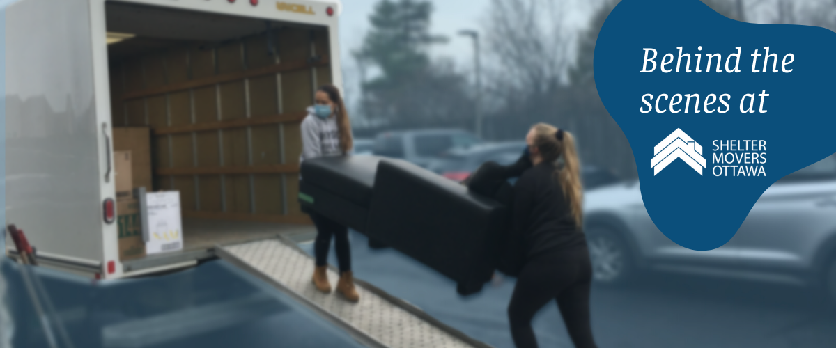 Women loading furniture onto truck