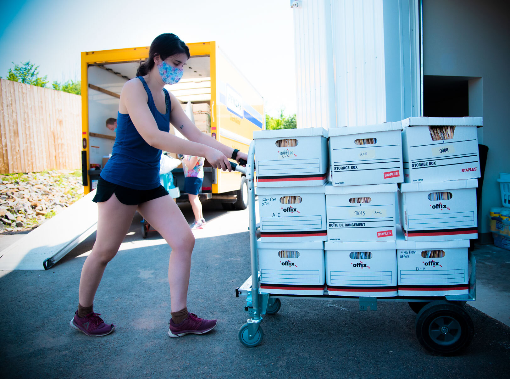 Woman moving boxes