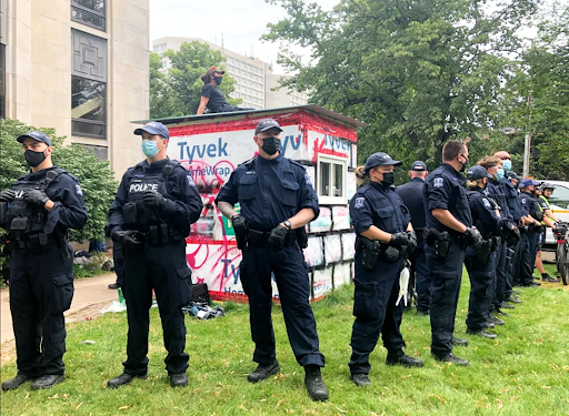 Halifax police surround one remaining shelter on Wednesday afternoon outside the old library on Spring Garden Road