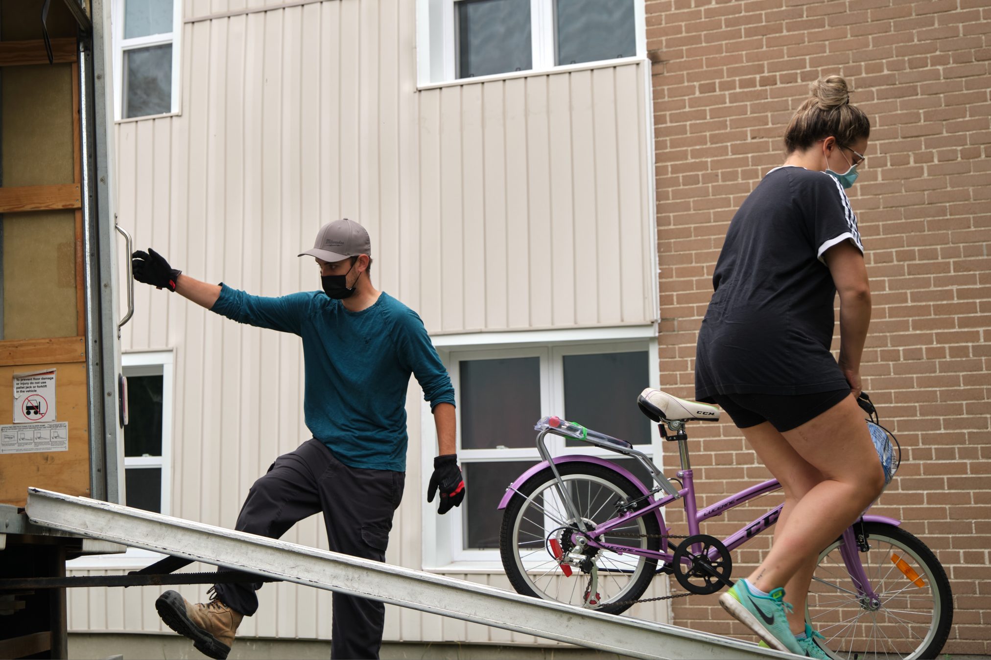 Volunteer movers unloading a truck