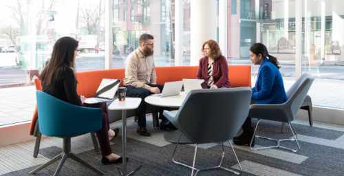 Four people at Emera having a meeting