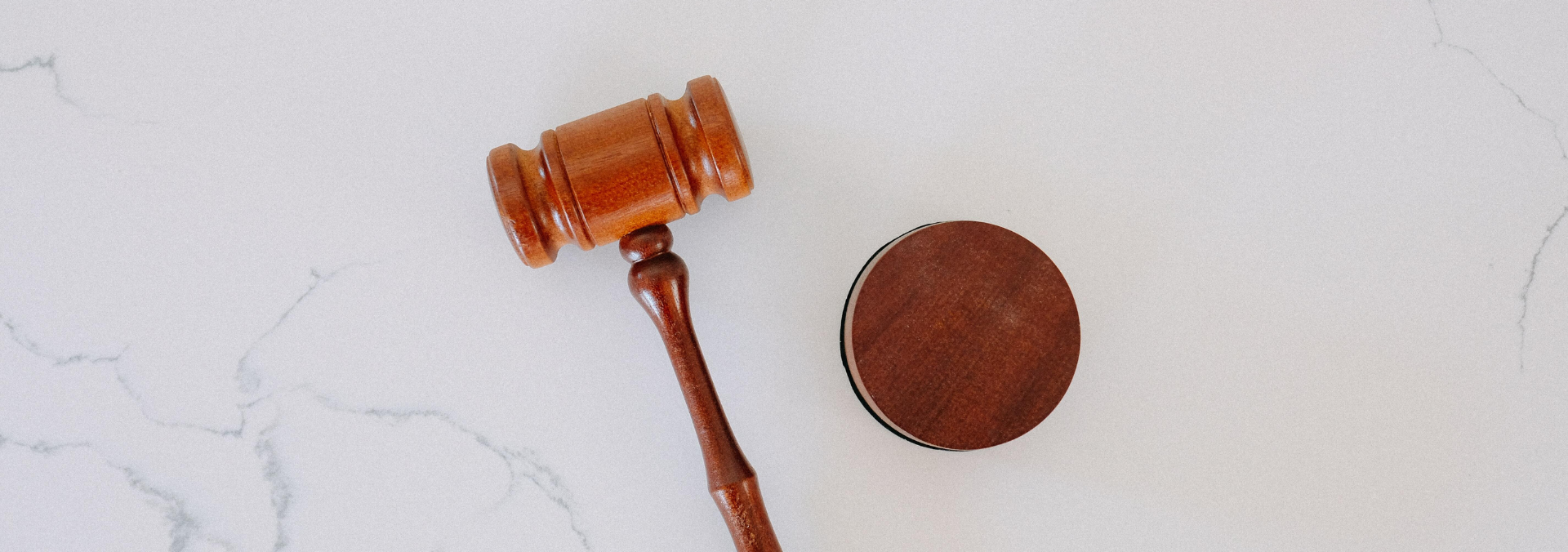 A gavel on a white background
